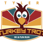 Logo for turkey trot at the top the word in yellow "TYLER" under that is clip art of a turkey face under the turkey the words Turkey Trot under that words K & Fun Run